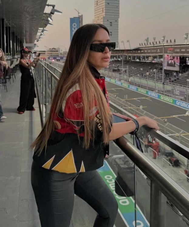 Jamila Awad hot in leather pants - Formula 1 race