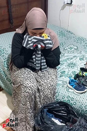 الضحية وملابس أبنائها الضحية وملابس أبنائها