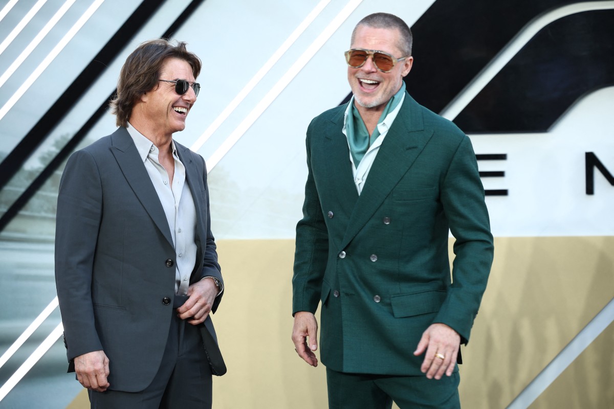 لقاء توم كروز وبراد بيت يفاجئ الجمهور (أ.ف.ب)