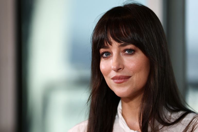 Dakota Johnson attends Kering Women in Motion Talk at the 78th Cannes Film Festival in Cannes, France, May 19, 2025. REUTERS/Stephane Mahe