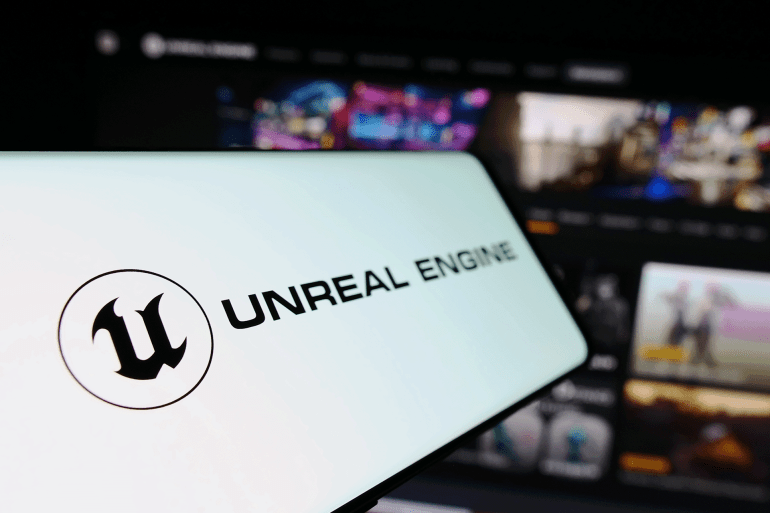 Stuttgart, Germany - 02-12-2024: Mobile phone with logo of 3D game software Unreal Engine (Epic Games) in front of business website. Focus on left of phone display. Unmodified photo.