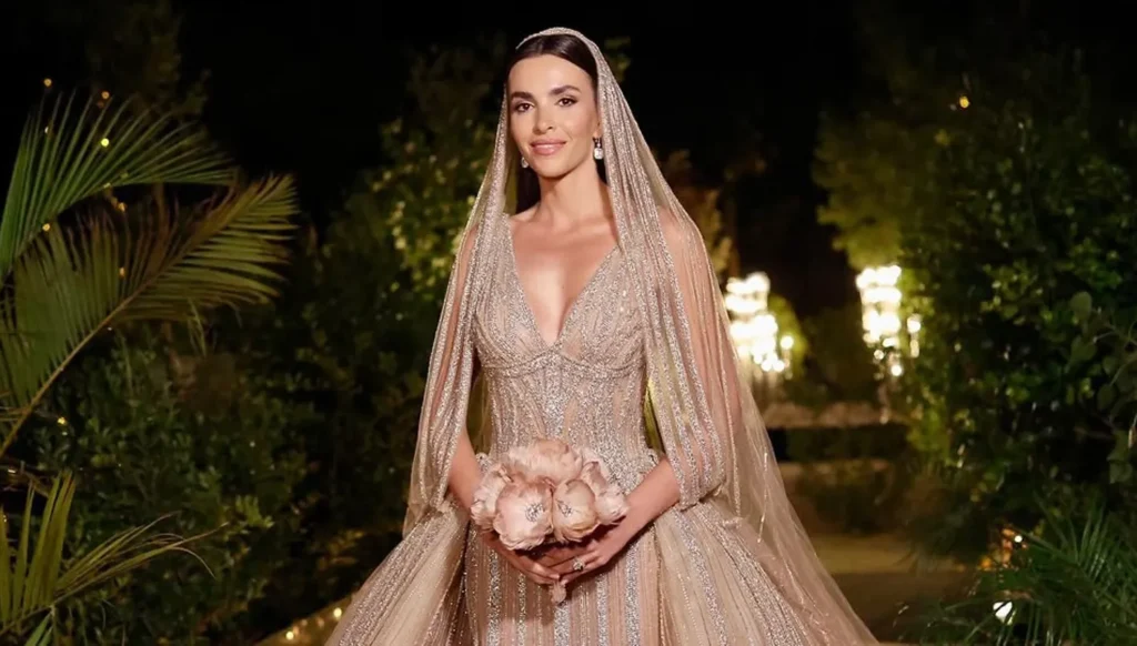 زين قطامي بفستان زفافٍ ثانٍ من توقيع إيلي صعب... إطلالة عنوانها الخلود الراقي