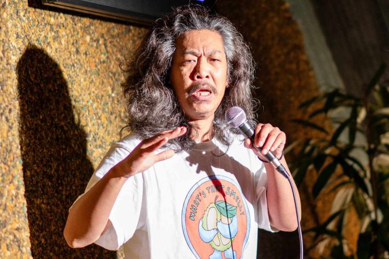 Comedian Bun Hay Mean at the Perchoir Comedy Club in Paris, France on 9 November 2023. (Photo by Stéphane Mouchmouche / Hans Lucas via AFP) (Photo by STEPHANE MOUCHMOUCHE/Hans Lucas/AFP via Getty Images)
