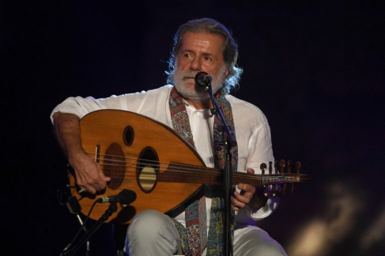 ارشيف Lebanese singer Marcel Khalife performs during the 54th edition of the International Carthage Festival at the Roman amphitheatre in Carthage, on the eastern outskirts of the capital Tunis, on July 26, 2018. (Photo by FETHI BELAID / AFP)