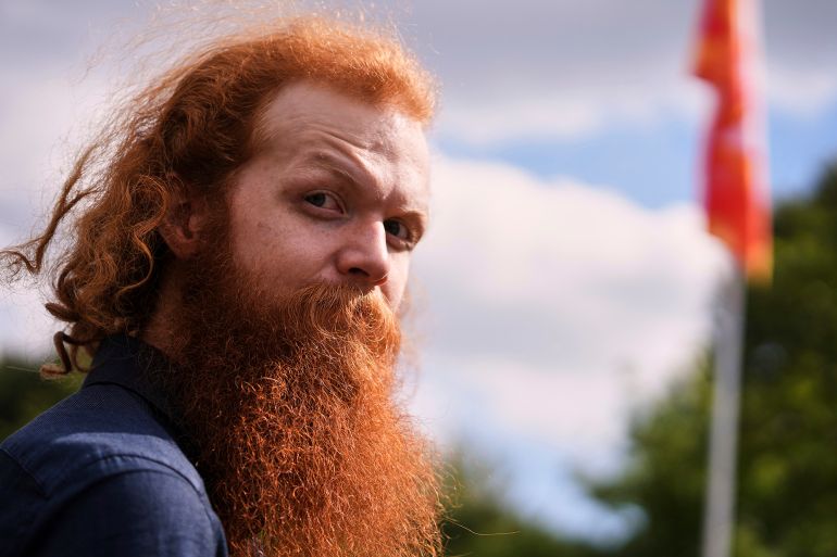 A participant attends the Red Head Days festival in Tilburg, Netherlands, Saturday, Aug. 30, 2025. (AP Photo/Virginia Mayo)
