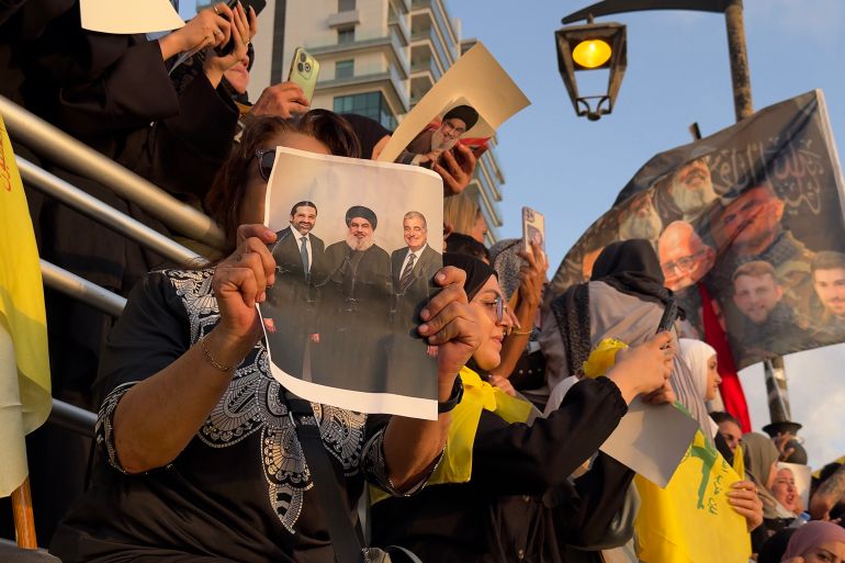 فعالية إضاءة صورتي الأمين العام لحزب الله حسن نصر الله ونائبه على صخرة الروشة في بيروت، في ذكرى اغتيالهما