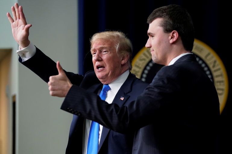 U.S. President Donald Trump concludes an onstage interview with moderator Charlie Kirk, founder of Turning Point USA, during a youth forum titled Generation Next, at the White House in Washington, U.S. March 22, 2018. REUTERS/Jonathan Ernst