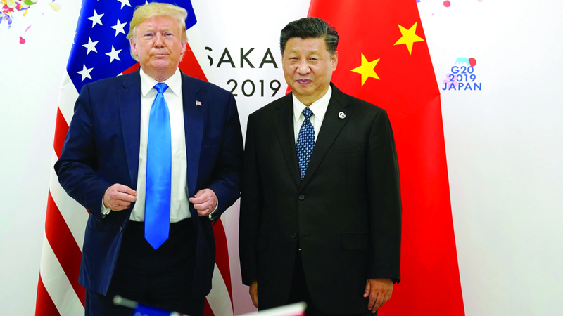 بكين تستخدم سلاح المعادن النادرة لمواجهة إدارة ترامب ترامب وشي خلال لقائهما في 2019. رويترز