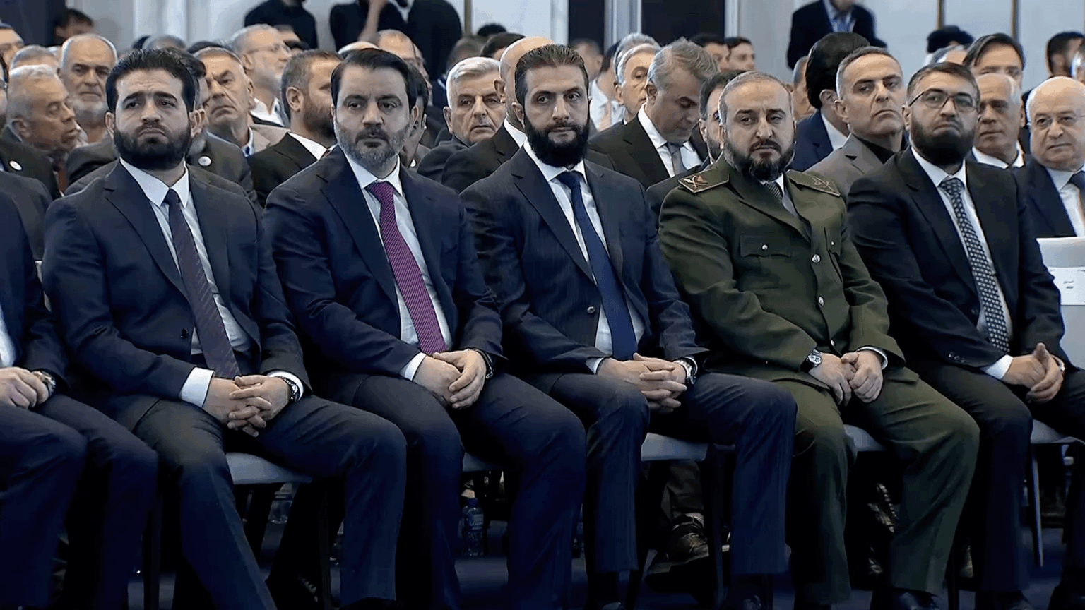 مراقبون سوريون يشرحون دلالات رفع العقوبات عن الشرع وخطاب | سياسة