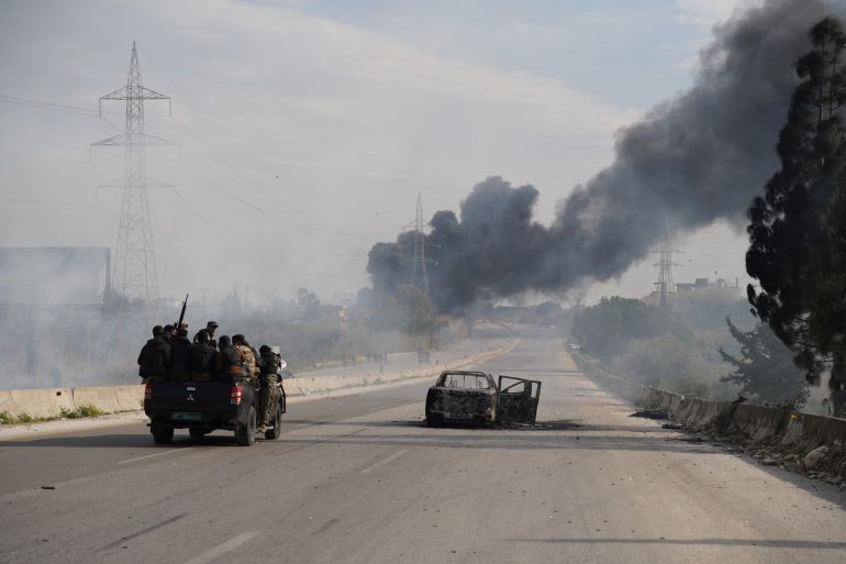 Black smoke rises as authorities extended the curfew in the cities of Latakia and Tartus in northwest Syria on Friday and launched large-scale security sweeps in urban centers, villages, and surrounding mountains to track down remnants of the deposed Bashar al-Assad regime on March 07, 2025 in Latakia, Syria (AA Photo)