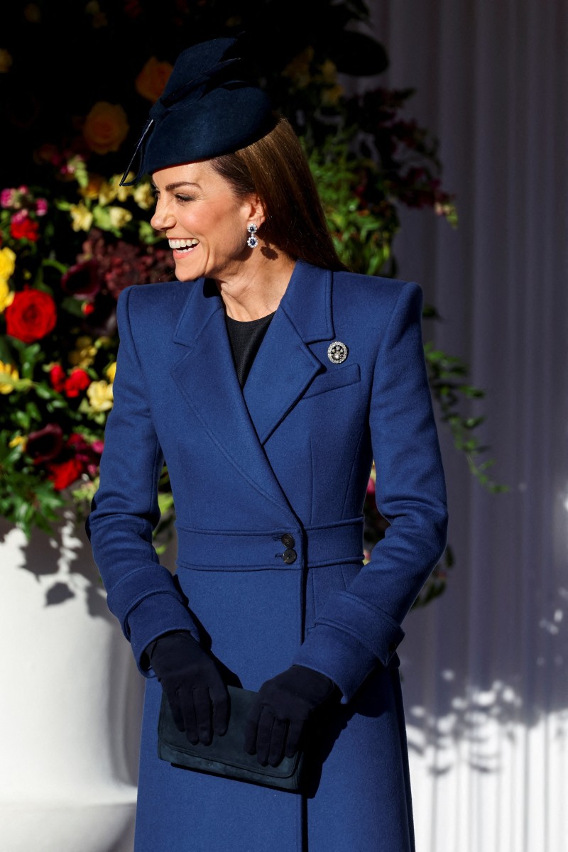 كيت ميدلتون تُعيد ارتداء معطف  الكسندر ماكوين في استقبال الرئيس الالماني (أ.ف.ب)