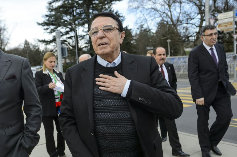 High Negotiations Committee (HNC) (Syrian opposition body) spokesmen Salem al-Meslet (L) and Riyad Naasan Agha (R) arrive for a press conference on Syrian peace talks at the Places des Nations outside of the United Nations Offices in Geneva on February 2, 2016. Syria's main opposition group said on February 2, 2016 that it will not attend a planned afternoon meeting with the UN special envoy, adding further doubts about the prospects for peace talks in Switzerland. (Photo by FABRICE COFFRINI / AFP)