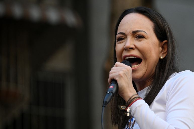 (FILES) Venezuelan opposition leader Maria Corina Machado gives a speech during a protest called by the opposition on the eve of the presidential inauguration, in Caracas on January 9, 2025.