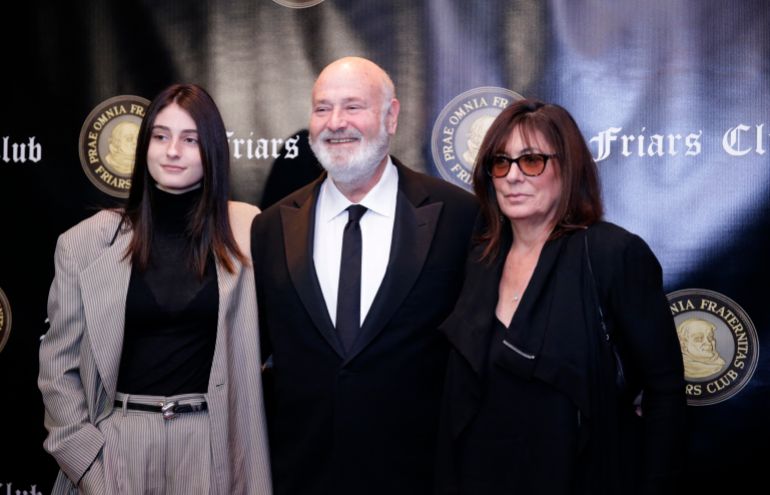 (FILES) Actor Rob Reiner (C), his wife actress Michele Reiner (R) and their daughter Rony Reiner attend the Friars Club Entertainment Icon Award ceremony at the Ziegfeld Ballroom on November 12, 2018, in New York City.
