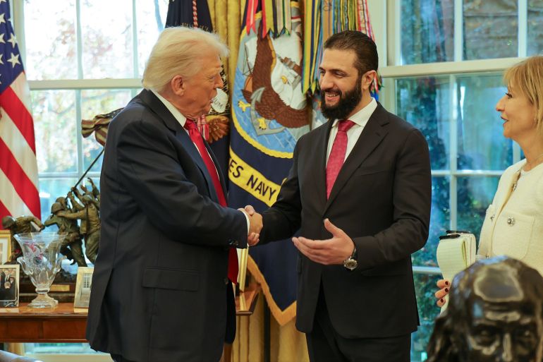 WASHINGTON DC, UNITED STATES - NOVEMBER 10: (----EDITORIAL USE ONLY - MANDATORY CREDIT - ' SYRIAN PRESIDENCY / HANDOUT' - NO MARKETING NO ADVERTISING CAMPAIGNS - DISTRIBUTED AS A SERVICE TO CLIENTS----) United States President Donald Trump meets with Syrian President Ahmed Shara at the White House in Washington DC , November 10, 2025. (Photo by Syrian Presidency/Anadolu via Getty Images)