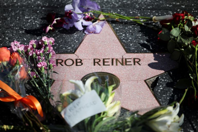 Flowers are placed at Rob Reiner's star on the Hollywood Walk of Fame, after the actor-director and political activist and his wife were found dead, in Los Angeles, California, U.S., December 15, 2025. REUTERS/Daniel Cole