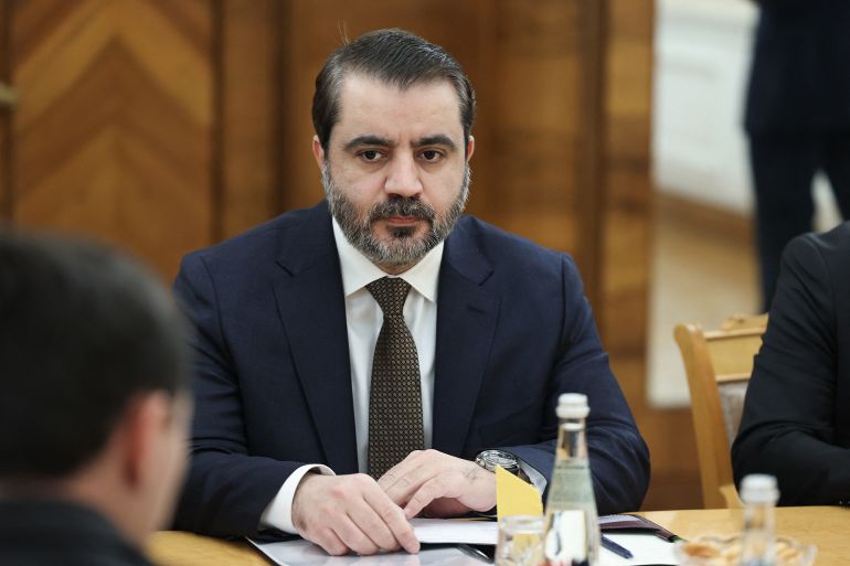 In this handout photograph taken and released by the Russian Foreign Ministry on December 24, 2025, Syrian Minister of Foreign Affairs and Expatriates Asaad Al-Shaibani attends a meeting with Russian Foreign Minister in Moscow. (Photo by Handout / RUSSIAN FOREIGN MINISTRY / AFP) / RESTRICTED TO EDITORIAL USE - MANDATORY CREDIT "AFP PHOTO / RUSSIAN FOREIGN MINISTRY" - HANDOUT - NO MARKETING NO ADVERTISING CAMPAIGNS - DISTRIBUTED AS A SERVICE TO CLIENTS