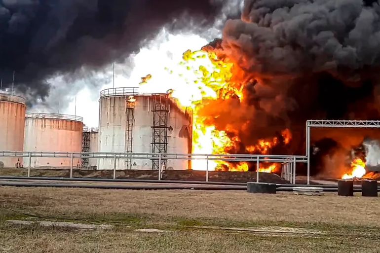 A Russian oil depot burns in the country's Belgorod region after the government accused Ukraine of launching a helicopter attack, April 1, 2022 [Russian Emergency Ministry Press Service via AP]