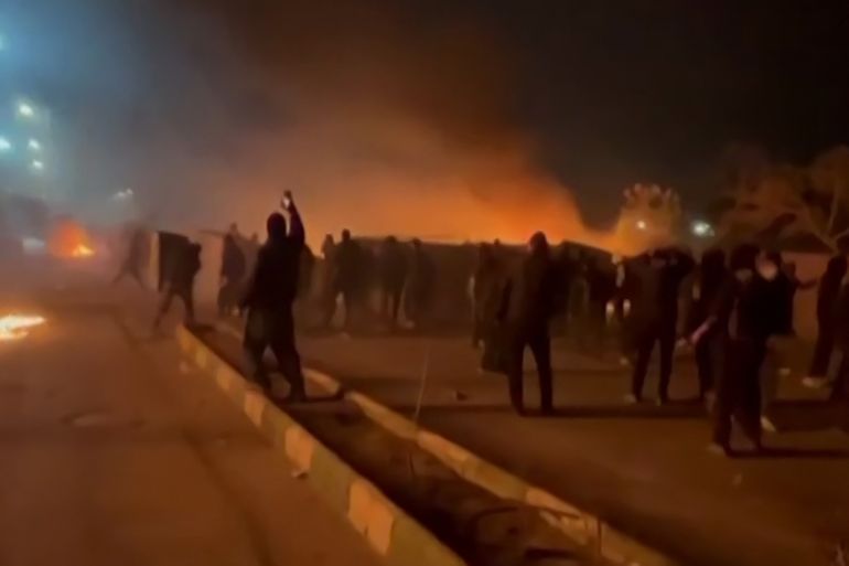 This video grab taken on January 13, 2026 from UGC images posted on social media on January 10, 2026 shows clashes in Mashhad, in northeastern Iran.