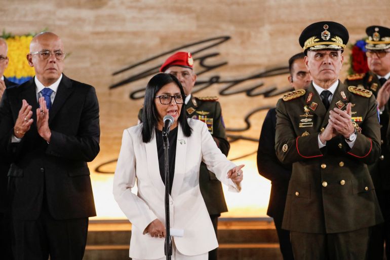 Venezuela's interim president Delcy Rodriguez, alongside Defence Minister Vladimir Padrino Lopez, delivers a speech, during the ceremony "Promotions and Decorations for Heroes and Martyrs", honouring Venezuelan and Cuban military and security personnel who died during a U.S. operation to capture Venezuela's President Nicolas Maduro and his wife Cilia Flores, in Caracas, Venezuela, January 8, 2026. REUTERS/Leonardo Fernandez Viloria