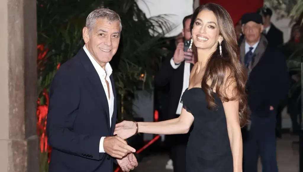 أمل وجورج كلوني يسرقان الأضواء خلال أولمبياد ميلانو كورتينا 2026