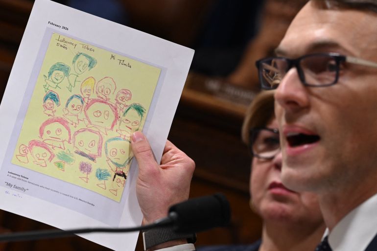 US Representative James Walkinshaw, Democrat from Virginia holds up a letter from a 5 year old detained in an federal facility during a House Committee on Homeland Security hearing on Oversight of the Department of Homeland Security on Capitol Hill in Washington, DC, on February 10, 2026.