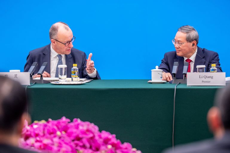 German Chancellor Friedrich Merz attends a meeting with Chinese Premier Li Qiang in the Great Hall of the People in Beijing, China, February 25, 2026. Michael Kappeler/Pool via REUTERS