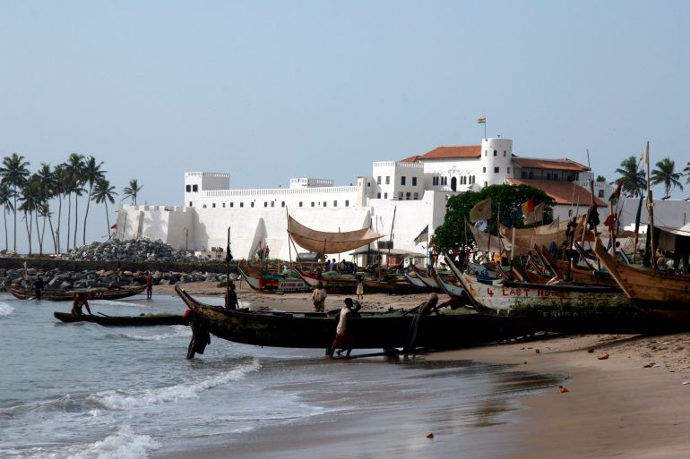 epa00967038 Ghanain fishermen come ashore in front of a 15th century slave fort, one of more than 30 dotted along Ghana's coast, ahead of a commemoration event to mark the 200th anniversary of the abolition of the British transatlantic slave trade held at St Georges Castle, Elmina, Ghana, Sunday 25 March 2007. The event, called 'Reflections' organised by the British Council brought together musicians, poets, choirs and dancers from across Ghana and the African diaspora. Ghana, then called The Gold Coast, was at the heart of the British slave trade which saw millions of Africans taken across the Atlantic Ocean to labour on plantations in the Caribbean and South America. Although slavery was legally abolished 200 years ago, today an estimated 27-million people worldwide are still enslaved. EPA/TUGELA RIDLEY