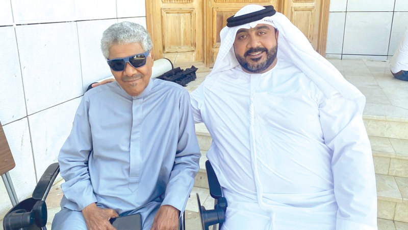 الحوسني بصحبة جابر نغموش. من المصدر