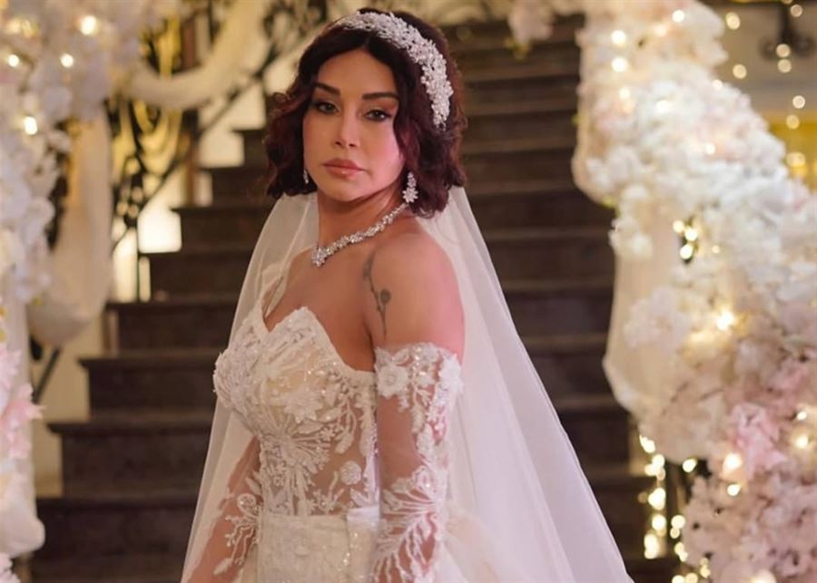 كاريس بشار تخطف الأنظار بإطلالة عروس عصرية ساحرة (صور) image