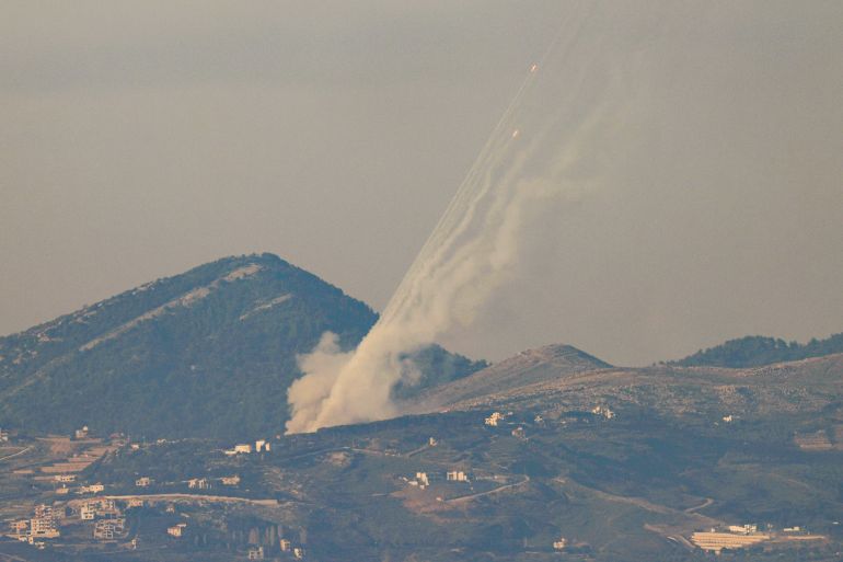 A picture taken along the Israel-Lebanon border shows rockets being fired from southern Lebanon towards Israel on March 3, 2026.