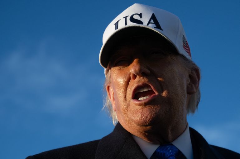 US President Donald Trump speaks to reporters before boarding Air Force One as he departs Joint Base Andrews in Maryland on March 13, 2026.
