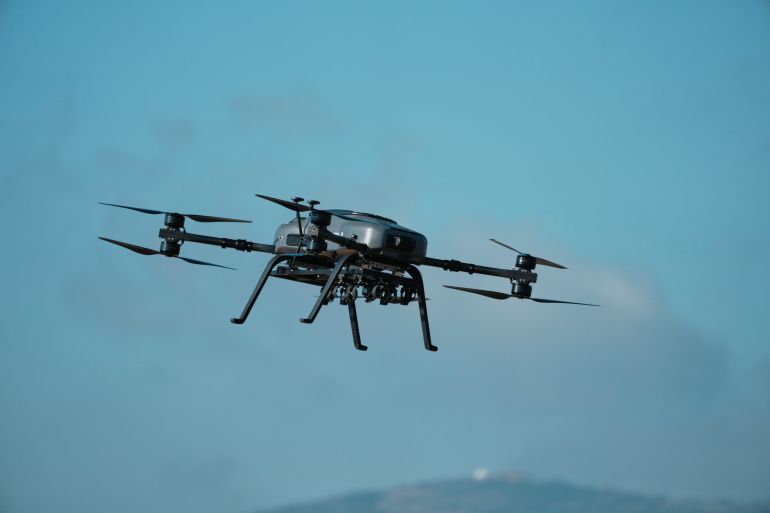 A drone flies during a live-fire exercise near the northeastern city of Alexandroupolis, Greece, testing domestically-developed drones and counter-drone systems as part of NATO's modernization efforts on Friday, Nov. 14, 2025. (AP Photo/Thanassis Stavrakis)