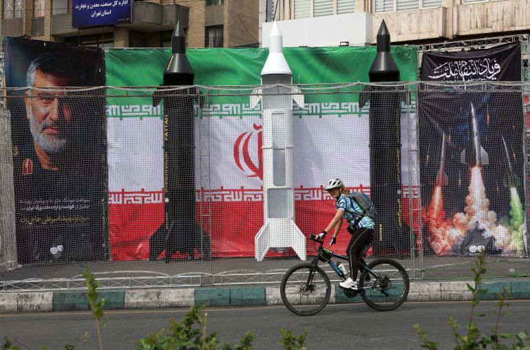 epa12840512 A cyclist in Tehran, Iran, 22 March 2026. US President Donald Trump has given Iran a 48-hour deadline to reopen strait of Hormuz or face further attacks to its energy infrastructure as a joint Israeli and US military operation continues to target multiple locations across Iran since the early hours of 28 February 2026. EPA/ABEDIN TAHERKENAREH