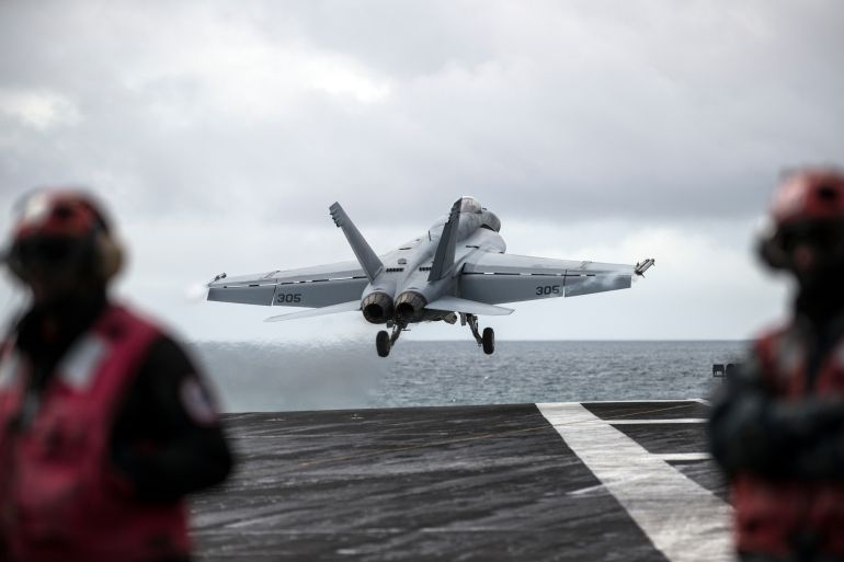 AT SEA, UNITED KINGDOM - AUGUST 06: An F/A-18 Hornet takes off during joint military exercise, Saxon Warrior, aboard the USS George H.W. Bush on August 6, 2017 off the north west coast of the United Kingdom. The American Aircraft carrier the USS George HW Bush is a nuclear powered 97,000-tonne, 20 story high Nimitz class aircraft carrier. It has a 4.5-acre flight deck with around 80 combat aircraft and is home to around 5,000 US Navy personnel who are currently conducting joint military exercises off the coast of the United Kingdom. (Photo by Dan Kitwood/Getty Images)