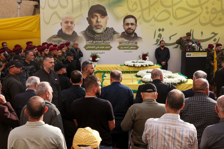 People attend the funeral of Hezbollah's top military official, Haytham Ali Tabtabai, and of other people who were killed by an Israeli airstrike on Sunday, despite a U.S.-brokered truce a year ago, in Beirut's southern suburbs, Lebanon November 24, 2025. REUTERS/Mohamed Azakir
