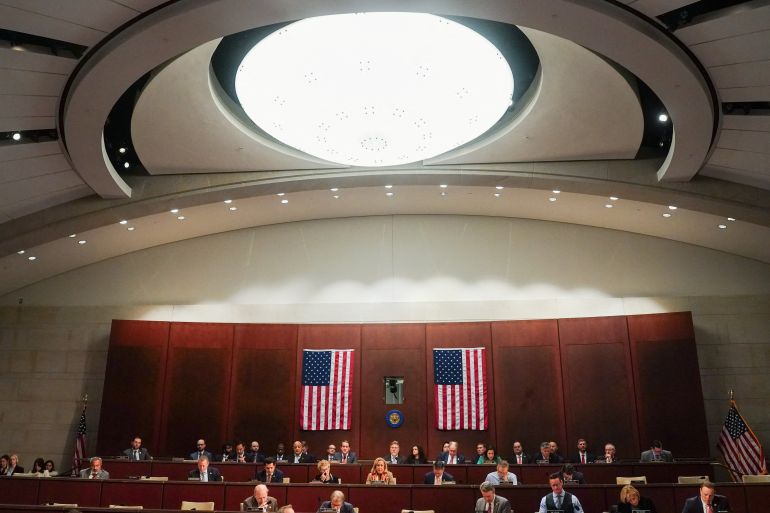 Members of the U.S. House Intelligence Committee sit on the day of the committee's hearing on worldwide threats, on Capitol Hill in Washington, D.C., U.S., March 19, 2026. REUTERS/Nathan Howard