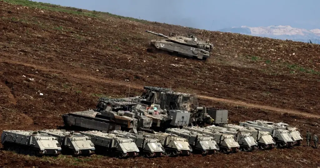 إسرائيل تحشد 70 ألف جندي على حدود لبنان وتنشر 4 فرق عسكرية