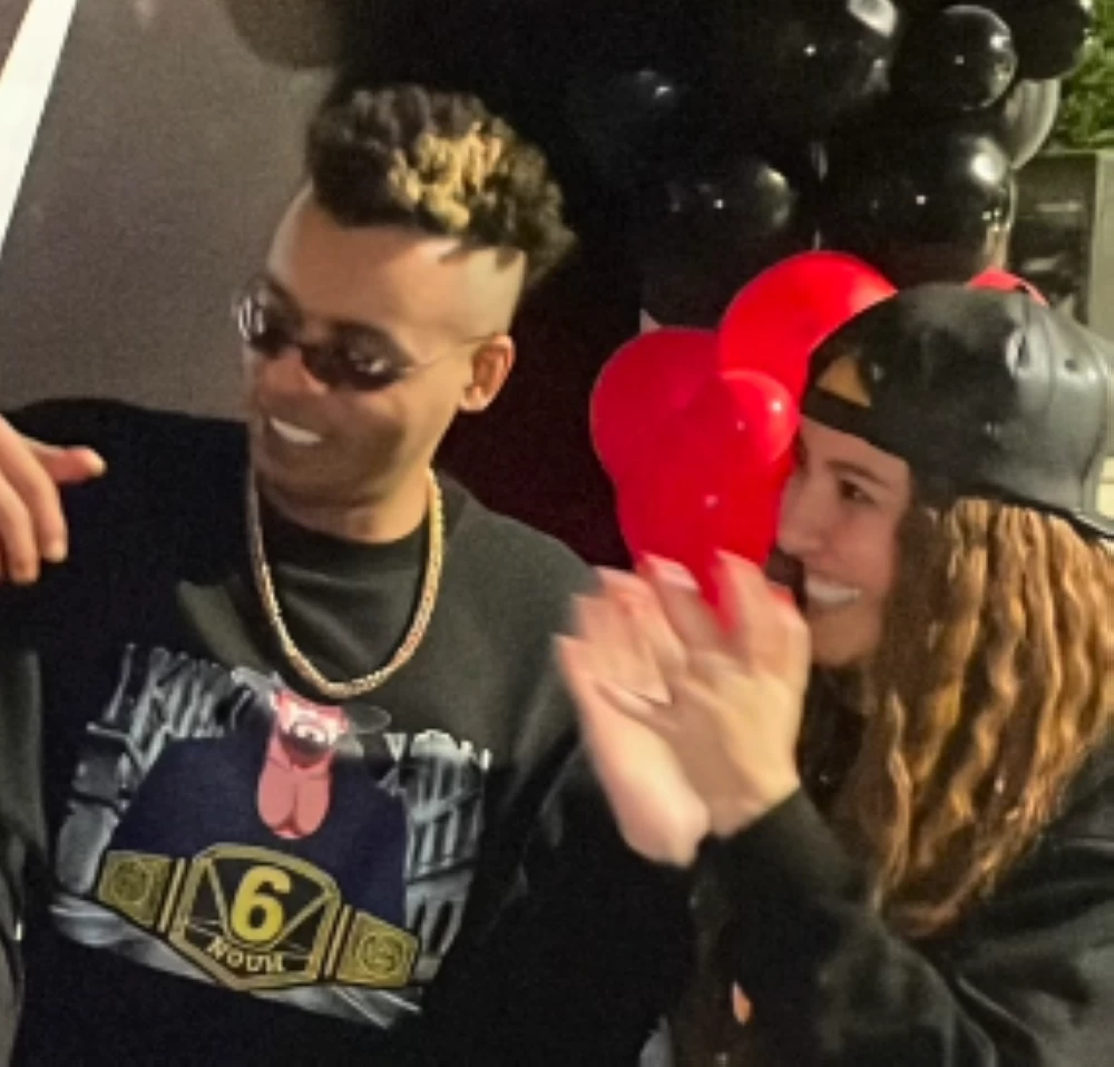 مى كساب وزوجها