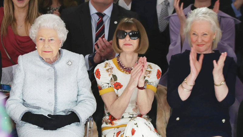 أنجيلا كيلي (مرتدية اللون الأسود) كانت تشارك مع الملكة الراحلة في الكثير من الفعاليات. أرشيفية