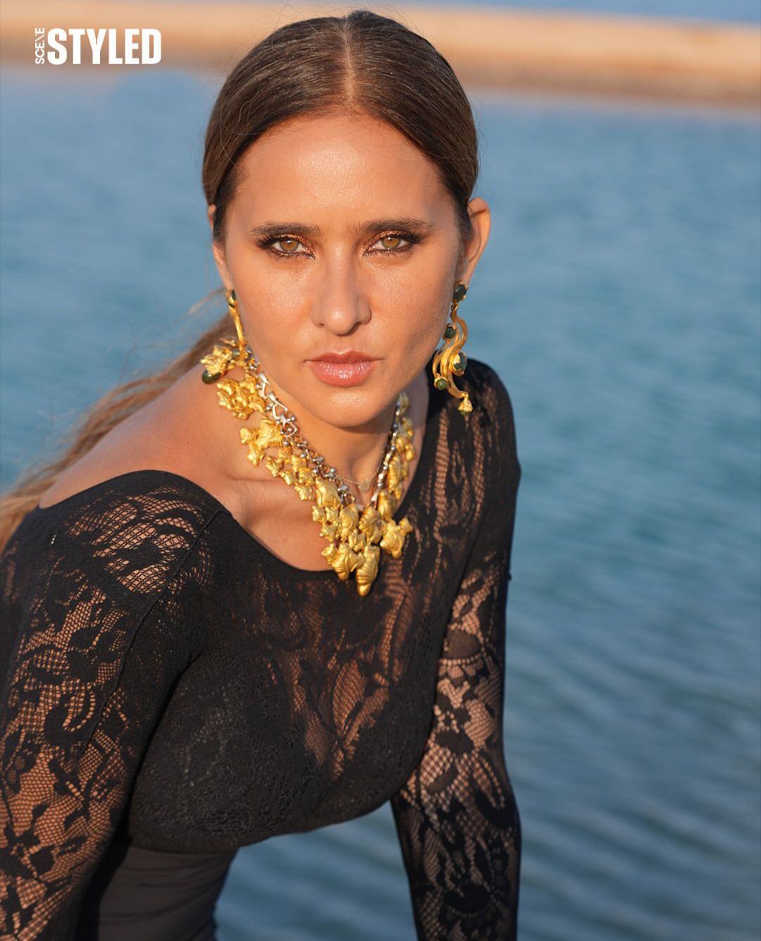 May be an image of jewellery and text that says 