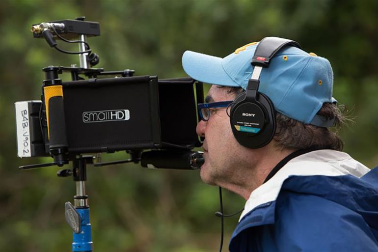 _المخرج أوليفر ستون أثناء تصوير فيلم سنودن (آي ام دي بي)