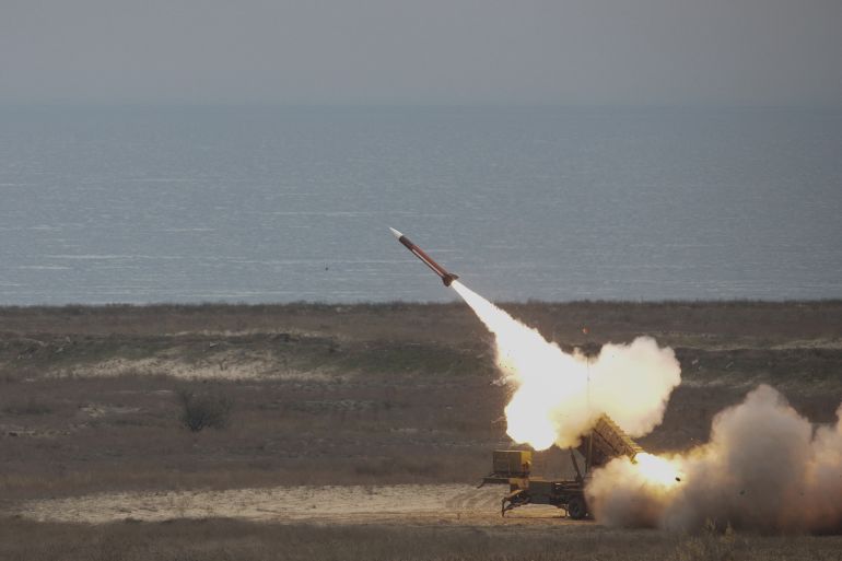 Patriot missile is fired during PATRIOT SPARK 23 exercise at the Black Sea training range in Capu Midia, Constanta, Romania, November 15, 2023. Inquam Photos/George Calin via REUTERS ATTENTION EDITORS - THIS IMAGE WAS PROVIDED BY A THIRD PARTY. ROMANIA OUT. NO COMMERCIAL OR EDITORIAL SALES IN ROMANIA