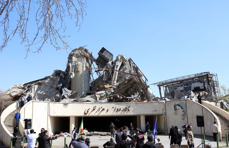 epa12867560 Media personnel work in front of the damaged Azadi sports complex in Tehran, Iran, 03 April 2026. A joint Israeli and US military operation continues to target multiple locations across Iran since the early hours of 28 February 2026. EPA/ABEDIN TAHERKENAREH