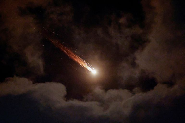 Streaks of light illuminate the sky during an interception attempt, amid the U.S.-Israeli conflict with Iran, as seen from Ashkelon, Israel, April 7, 2026. REUTERS/Amir Cohen TPX IMAGES OF THE DAY