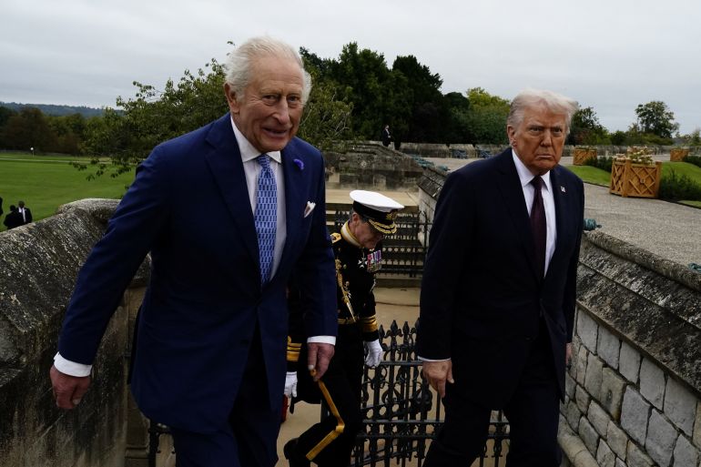 US President Donald Trump and King Charles III walk following a Beating Retreat military ceremony at Windsor Castle, Berkshire, on day one of the president's second state visit to the UK. Picture date: Wednesday September 17, 2025. Jordan Pettitt/Pool via REUTERS