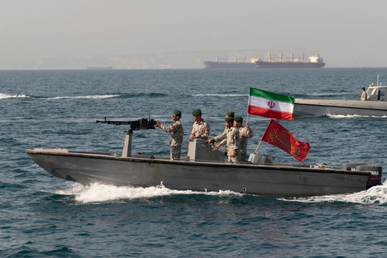 Iranian Navy soldiers at an armed speed boat in Persian Gulf near the strait of Hormuz about 1320km (820 miles) south of Tehran, April 30, 2019. (Photo by Morteza Nikoubazl/NurPhoto via Getty Images)
