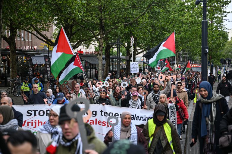 ROTTERDAM, NETHERLANDS - MAY 15: Large crowds march through the streets of Rotterdam during a demonstration marking Nakba Day in Netherlands on May 15, 2026. The protest began at Schouwburgplein before moving through the city center in a silent procession. ( Mouneb Taim - Anadolu Agency )