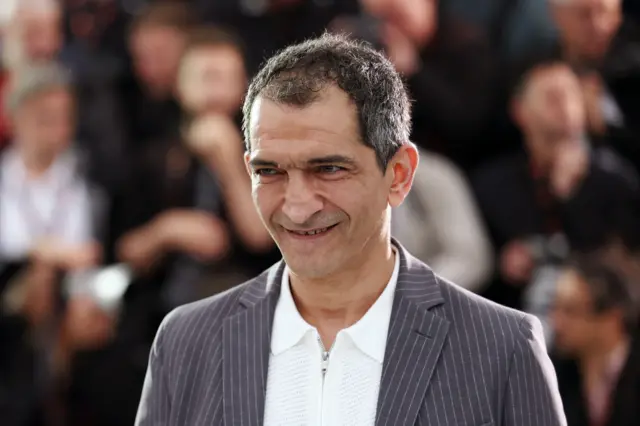 الممثل المصري عمرو واكد خلال مهرجان كان السينمائي عام 2025