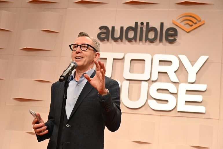 NEW YORK, NEW YORK - APRIL 30: Bob Carrigan speaks onstage during the opening of Audible Story House, the first-ever bookless bookstore on April 30, 2026 in New York City. Bryan Bedder/Getty Images for Audible/AFP (Photo by Bryan Bedder / GETTY IMAGES NORTH AMERICA / Getty Images via AFP)